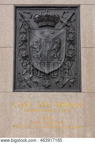 Sweden, Stockholm - July 16, 2022: Outside Royal Palace On Slottsbacken. Closeup Of Black Metal Coat