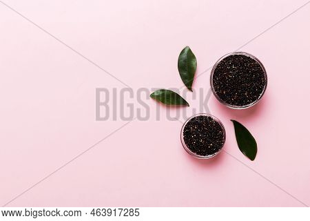 Quinoa Seeds In Bowl On Colored Background. Healthy Kinwa In Small Bowl. Healthy Superfood.