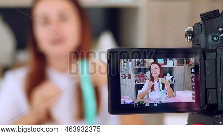 Gifts Wrapping. Attractive Woman, Designer Of Gifts And Decorations Shows Training Online, Records V