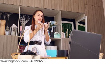 Designer Of Gifts And Decorations Conducts Training Online, Videoconference., Records Video Blog, We
