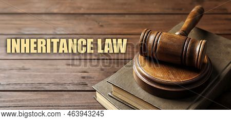 Phrase Inheritance Law And Wooden Gavel With Books On Wooden Background, Banner Design