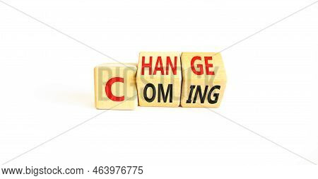 Change Is Coming Symbol. Concept Words Change And Coming On Wooden Cubes. Beautiful White Table Whit