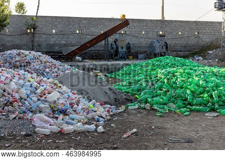 Malakand Division , Kpk, Pakistan, October, 07, 2022: Plastic Bottles Waste In The Factory For Recyc