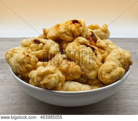Italian Crispeddi Calabresi Ca' Lici. Calabrian Crispeddi. Traditional Fried Salted Donuts With Piec