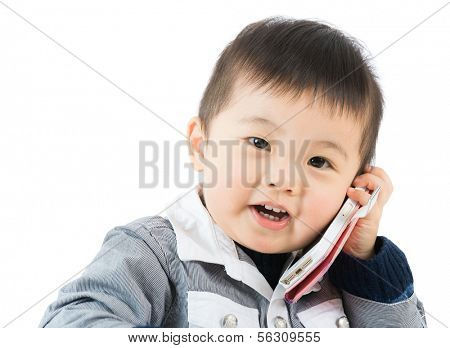 Little boy talk to phone