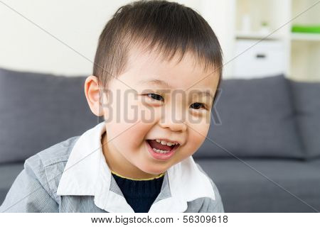Asian little boy laugh