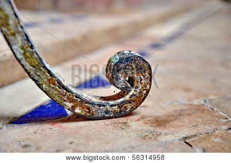 Leg Of An Iron Chair On Moroccon Type Tiles