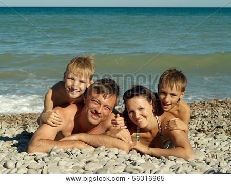 Family swimming in the sea