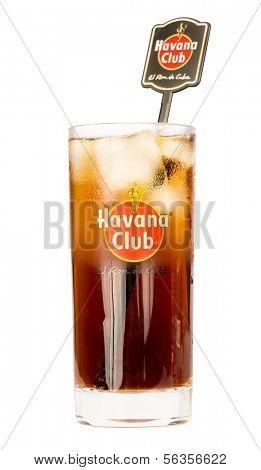 HAVANA,CUBA -?? DECEMBER 25, 2013:Havana Club highball glass containing a Cuba Libre.Established in 1878 in Santa Cruz del Norte in Cuba, Havana Club is the world's No.3 international rum brand