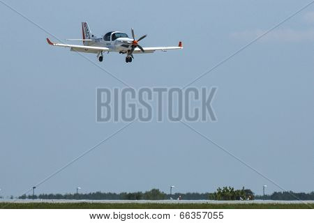 BERLIN, GERMANY - MAY 20, 2014: Two seated training and aerobatic low-wing aircraft Grob G120 TR (Germany), demonstration during the International Aerospace Exhibition ILA Berlin Air Show.