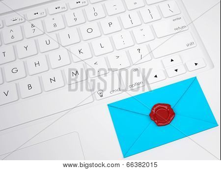 Envelope with stamp on the keyboard