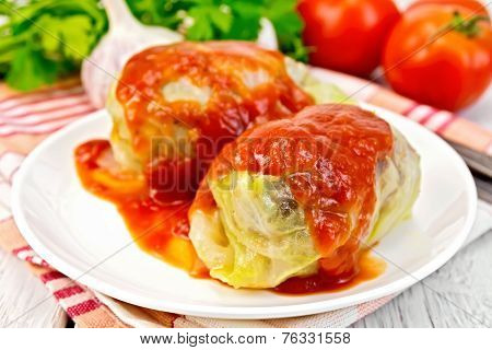 Cabbage stuffed in plate on board