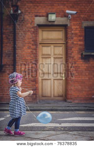 Girl with a baloon