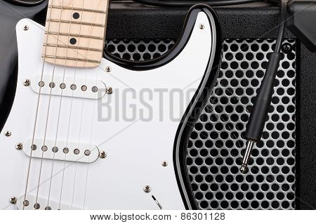 Guitar With Amplifier And Audio Cord