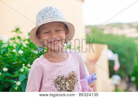 Adorable little girl have fun outdoors