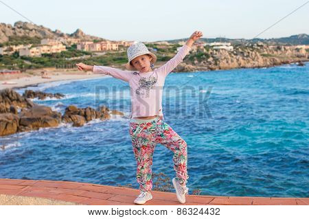 Adorable cute little girl have fun outdoor at italian vacation
