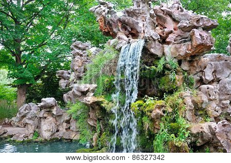 Small Waterfall In Beautiful Park