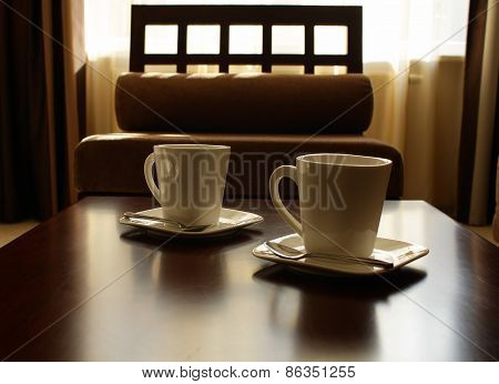 Tea cups. Set for two persons, served in japan style interior