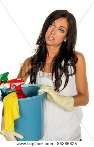 a young woman is annoyed that she has to make the house cleaning.