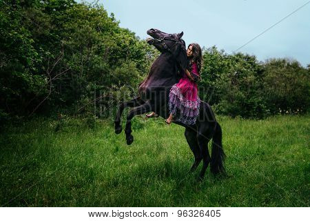Beautiful woman on a horse