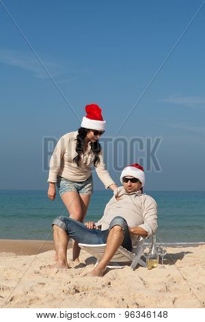 Christmas Couple On A Beach