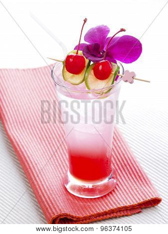 Thai Red Cocktail with orchid, lime and cherry