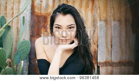 Beautiful face with slight smile young Asian woman