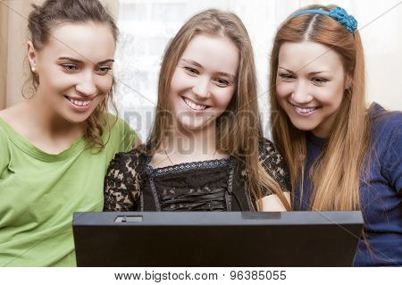 Modern Lifesrtyle Concept. Portrait Of Three Young Happy Laughing Caucasian Girlfriends With Persoma