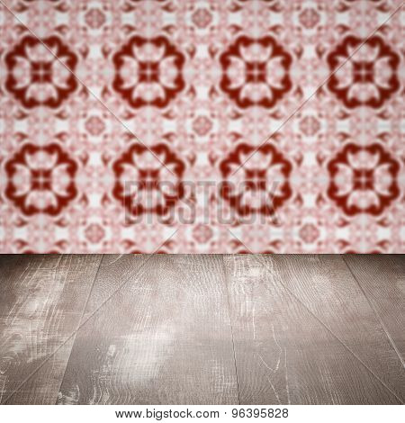 Wood Table Top And Blur Vintage Ceramic Tile Pattern Wall