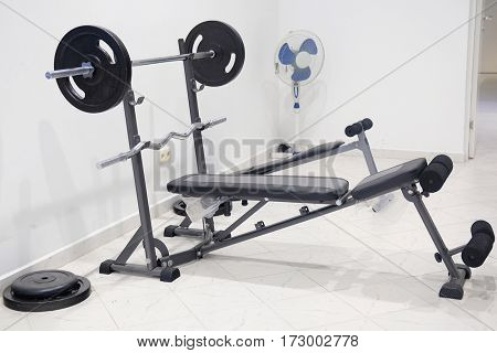 The image of wights in a fitness hall