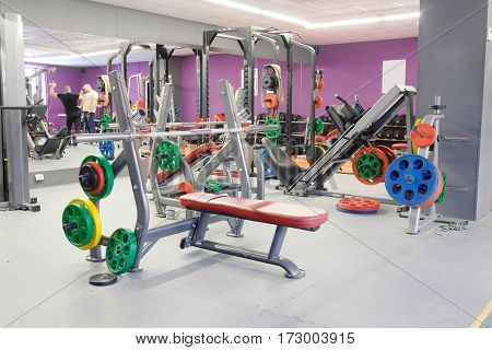 The image of wights in a fitness hall