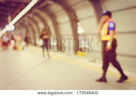 Blurred Image Of Passengers Waiting For Train & Security Man Is Working At Railway Station, Train St