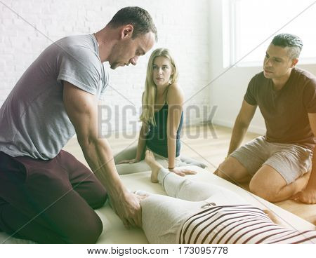 Group of people massage training course