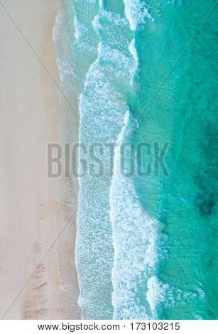 Aerial view. Top view.amazing nature background.The color of the water and beautifully bright.Azure beach with rocky mountains and clear water of Thailand ocean at sunny day.