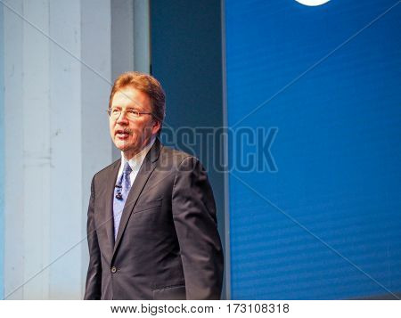 MUNICH GERMANY - FEBRUARY 16 2017: IBM Cognitive Solutions and Research Senior Vice President John Kelly delivers an address to IBM Genius of Things Summit in Munich Germany on February 16 2017.
