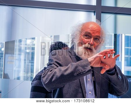 MUNICH GERMANY - FEBRUARY 16 2017: IBM Fellow in the IBM Internet of Things division John Cohn presents Watson IoT headquarter to journalists in Munich Germany on February 16 2017.