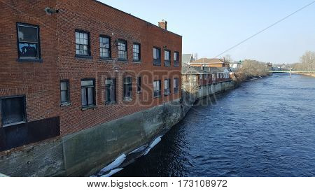 AN OLD BUILDING ON THE RIVER IN BELLEVILLE ONTARIO CANADA