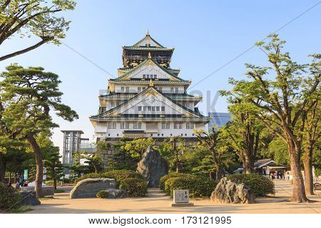 OSAKA JAPAN - AUGUST 1 2015 : The front view of Osaka Castle during summer season this castle is very famous historic tourist attraction of Osaka Japan.