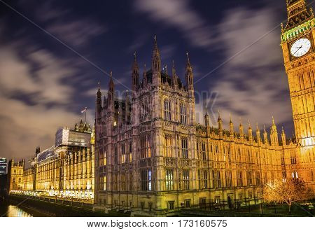 Big Ben Tower Westminster Bridge Thames River Night Houses of Parliament Westminster London England. Named after the Bell in the Tower. Has kept exact time since 1859.