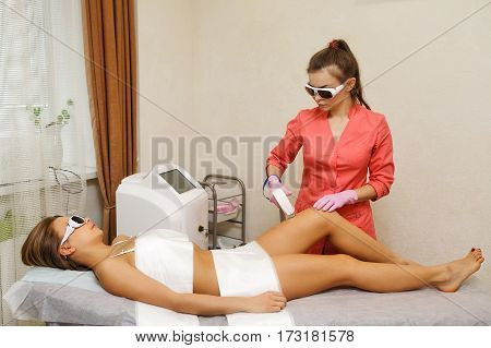 Laser hair removal hip girl. Hardware cosmetology. Cosmetic procedures. Spa.