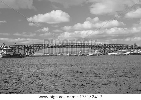 Black and White double desk bridge Red Bridge Minato Bridge over Osaka sea port Japan