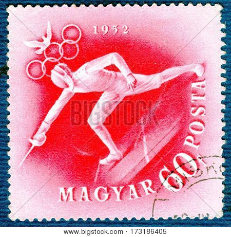 HUNGARY - CIRCA 1952: Postage stamp printed in Hungary  with a picture of a fencing, from the series 