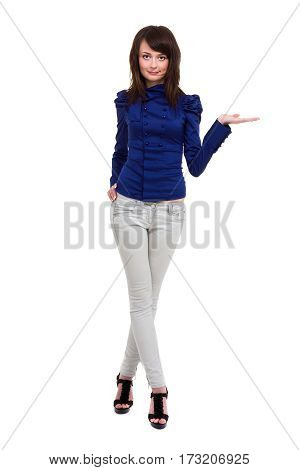 Full length portrait of a happy thoughtful woman holding copyspace on the palm isolated on a white background