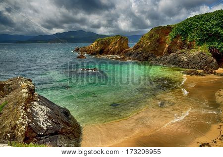 Ocean coast in the north west of Spain, Galicia region, little town of Porto de Espasante, urban beaches detail