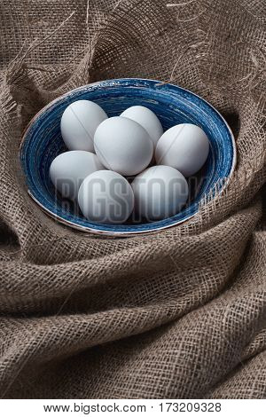 Ecological natural fresh eggs collected in the plate for cooking