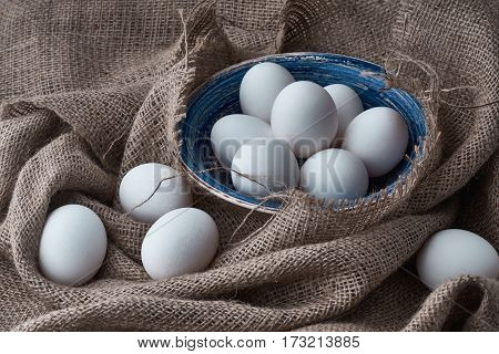 Ecological natural fresh eggs collected in the plate for cooking