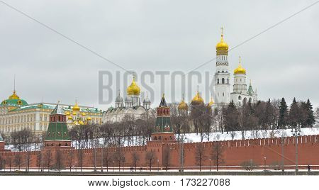 MOSCOW - February 24, 2017 View from the Sofia quay at Archangel and Annunciation Cathedral. Moscow Kremlin . Beautiful scenery on the background of the cloudy sky.