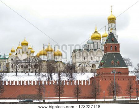 MOSCOW - February 24, 2017 View from the Sofia quay at Archangel and Annunciation Cathedral. Moscow Kremlin . Beautiful scenery on the background of the cloudy sky.