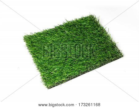 Grass mat on white background. Artificial turf tile.