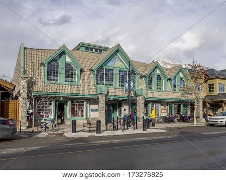 CANMORE, CANADA - FEB 19: Commercial buildings on February 19, 2017 in Canmore, Alberta, Canada. Before Canmore became a mountain tourist destination, it was a mining town.